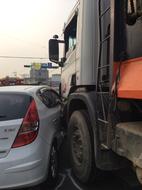 Crashed Car and Dump Truck