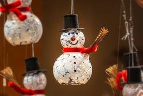brightly colored christmas snowman toy
