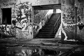 black and white photo of an abandoned train station platform