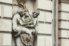 sculptures on the facade of a building in London