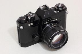 reflex camera with a button on the front