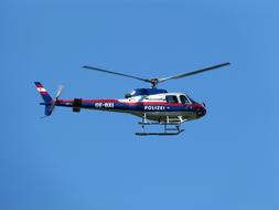 colored helicopter in the sky