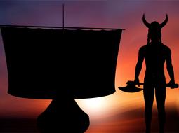 Viking silhouette by the ship