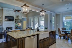 Beautiful and colorful interior of the kitchen in the house, with the lamps