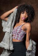 dark-skinned model with curls