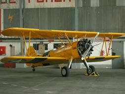 yellow plane on the street