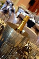 bottle of champagne in a bucket on the table
