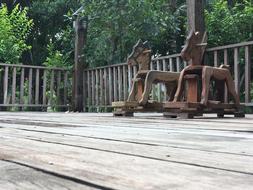 toy horses on the terrace