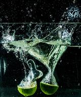 splashing water with limes