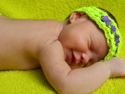 sleeping baby in a hat