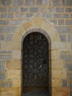 wooden doors with patterns to the church