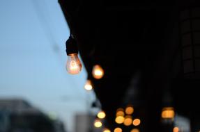 burning street lamps on the roof