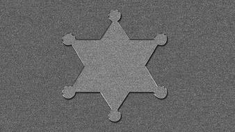 sheriff badge silhouette on a gray background
