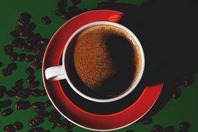 ground coffee beans in a mug