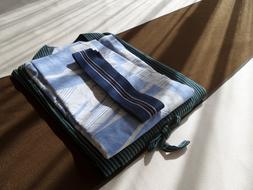 cozy clothes on the bed in the hotel