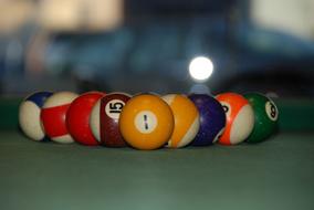 billiard colored balls on the table
