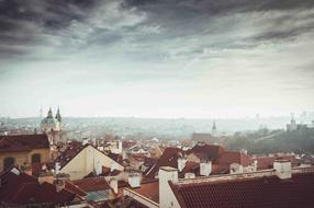 foggy morning over the city in prague