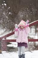 Throwing Snowballs in child at Winter