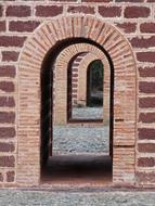 arched openings in the brick architecture of the Freemasons