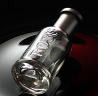 glass bottle with the boss signature