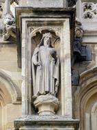 statue on the facade of a medieval building