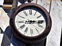 wooden clock on the street