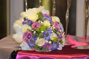 a beautiful bouquet of flowers on a table of color