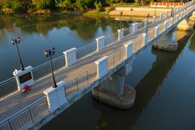 span of a modern bridge over the river