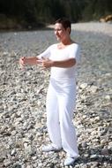 cheerful woman in a white suit