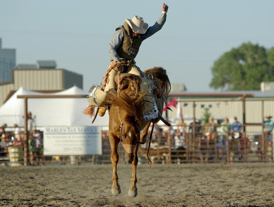 riding a horse in a western