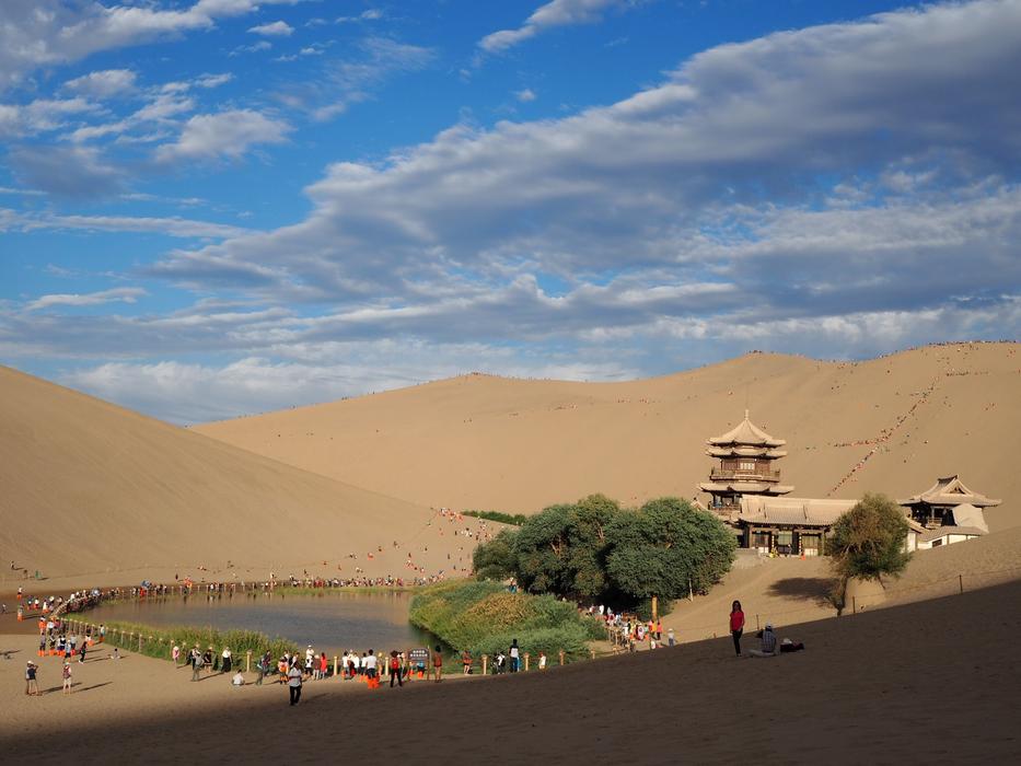 beautiful lake with a house in the desert