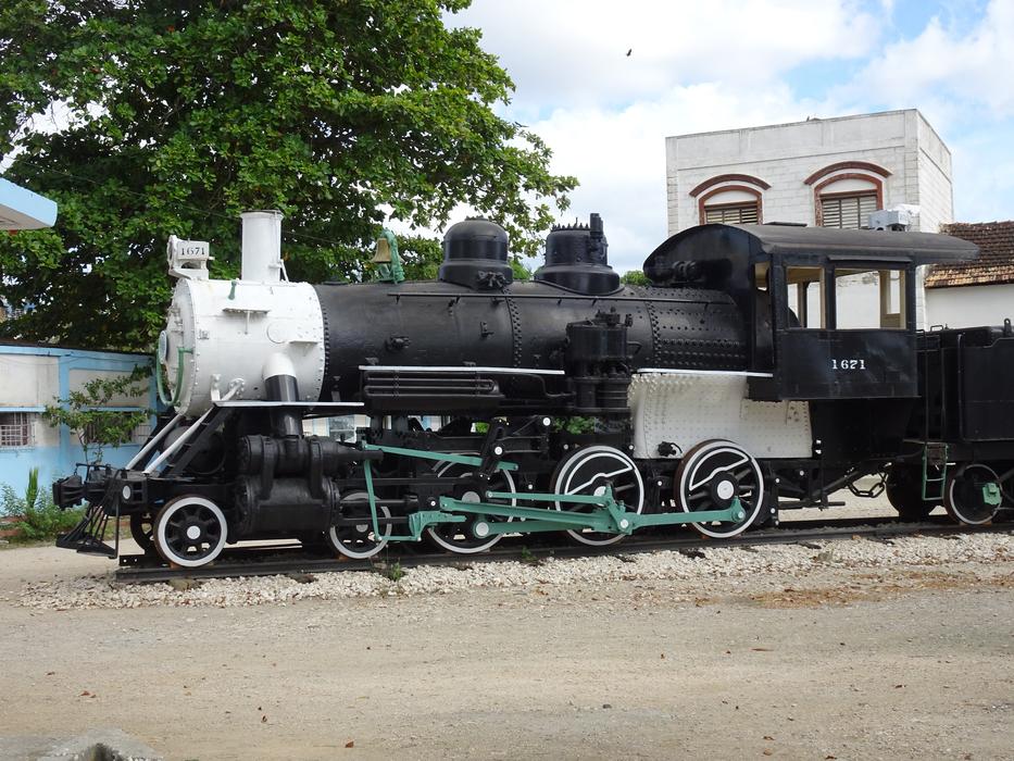 old black train at the station
