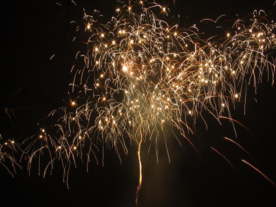 bright flashes of fireworks in the sky