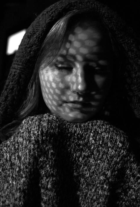 beautiful girl with a shadow on her face