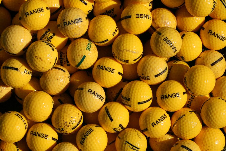 lot of yellow balloons with a signature