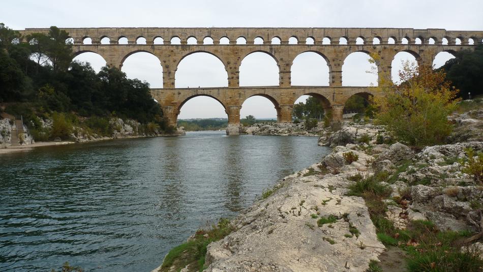 high bridge with arches by the river