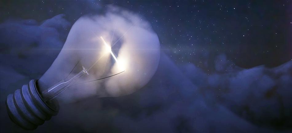 fantastic picture of a light bulb burning in the mountains