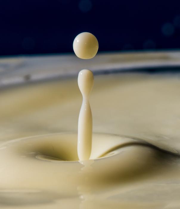 milk drops in a mug