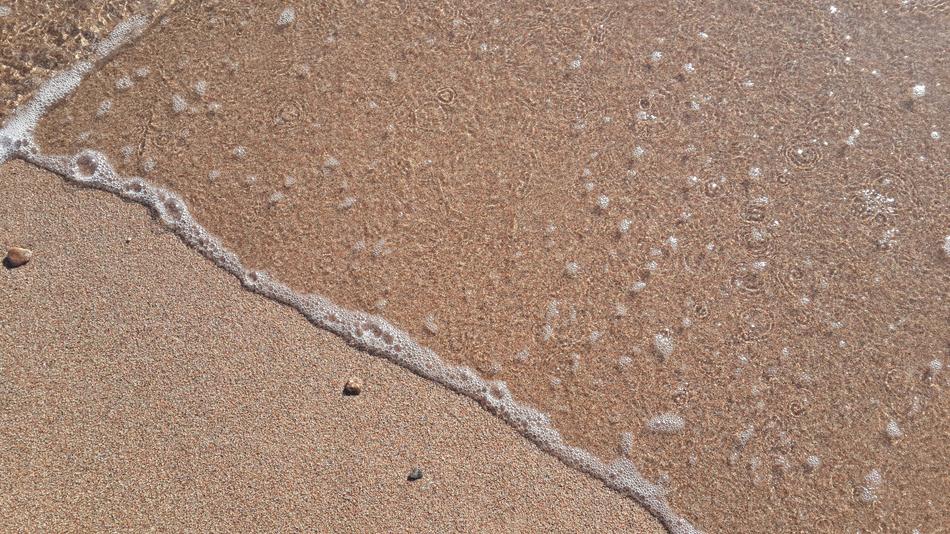 Sand Sea Coast closeup view