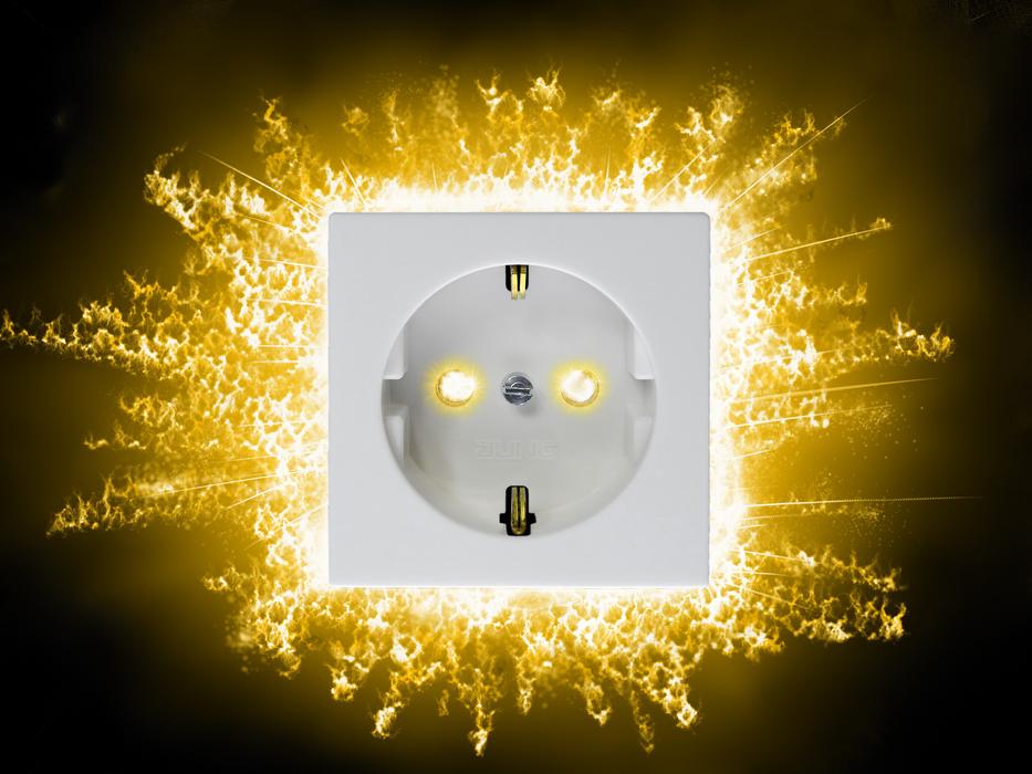 sparks near the white socket