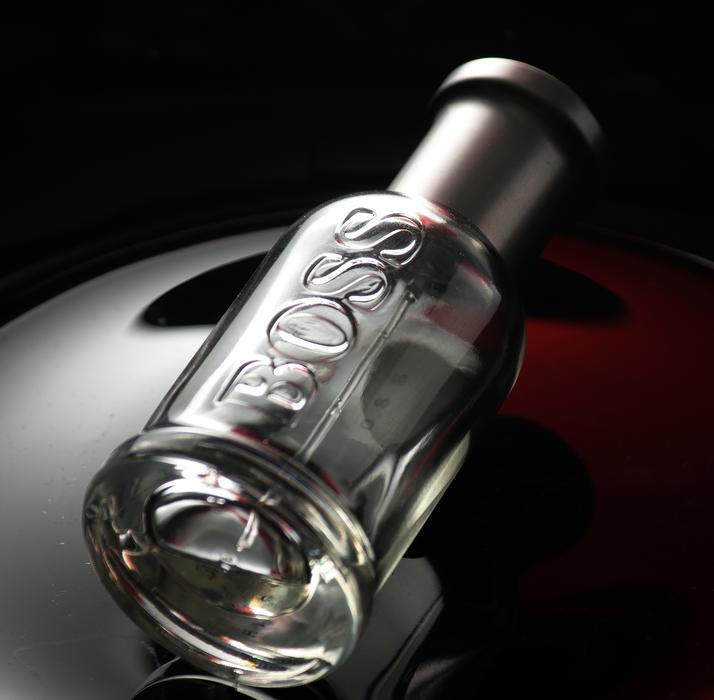 glass bottle with the boss signature
