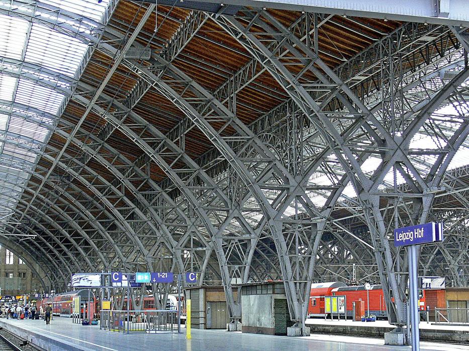 Landscape of the colorful platform hall of Leipzig Hbf, in Germany, with the signs