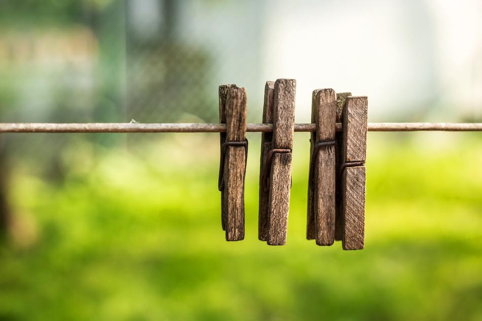 wooden clothespins on a string