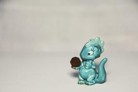 blue dinosaur on the table