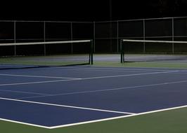 sports tennis court at night
