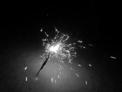 sparks from the fire on a stick
