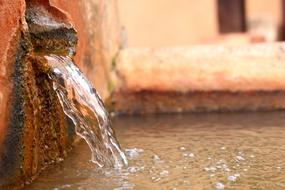 water pouring from a pipe