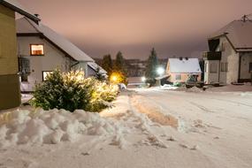 a cozy street with snow