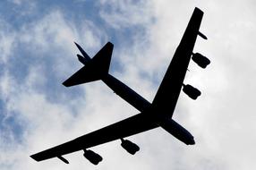 silhouette of an airplane in the sky