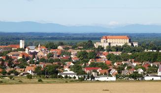 Beautiful and colorful landscape of SiklÃ³s, with the castle and other buildings, among the green trees and mountains, in Baranya, Hungary